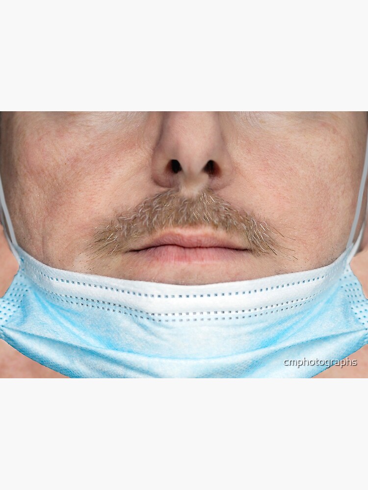 A badly worn medical mask - Man by cmphotographs