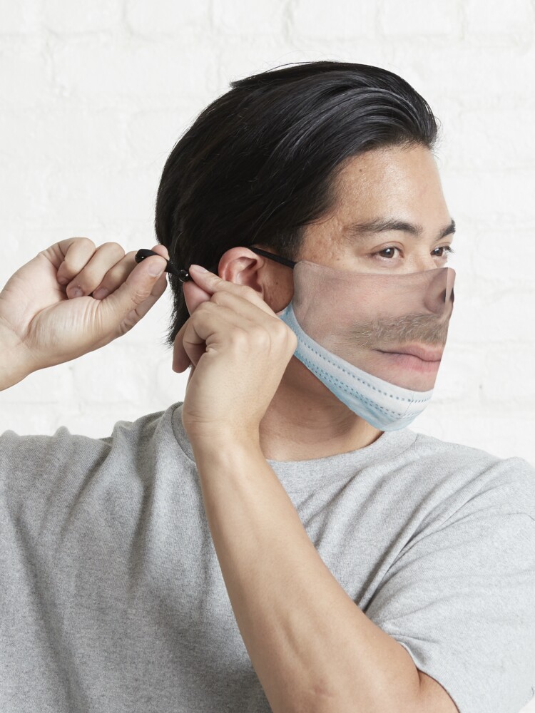 Alternate view of A badly worn medical mask - Man Mask