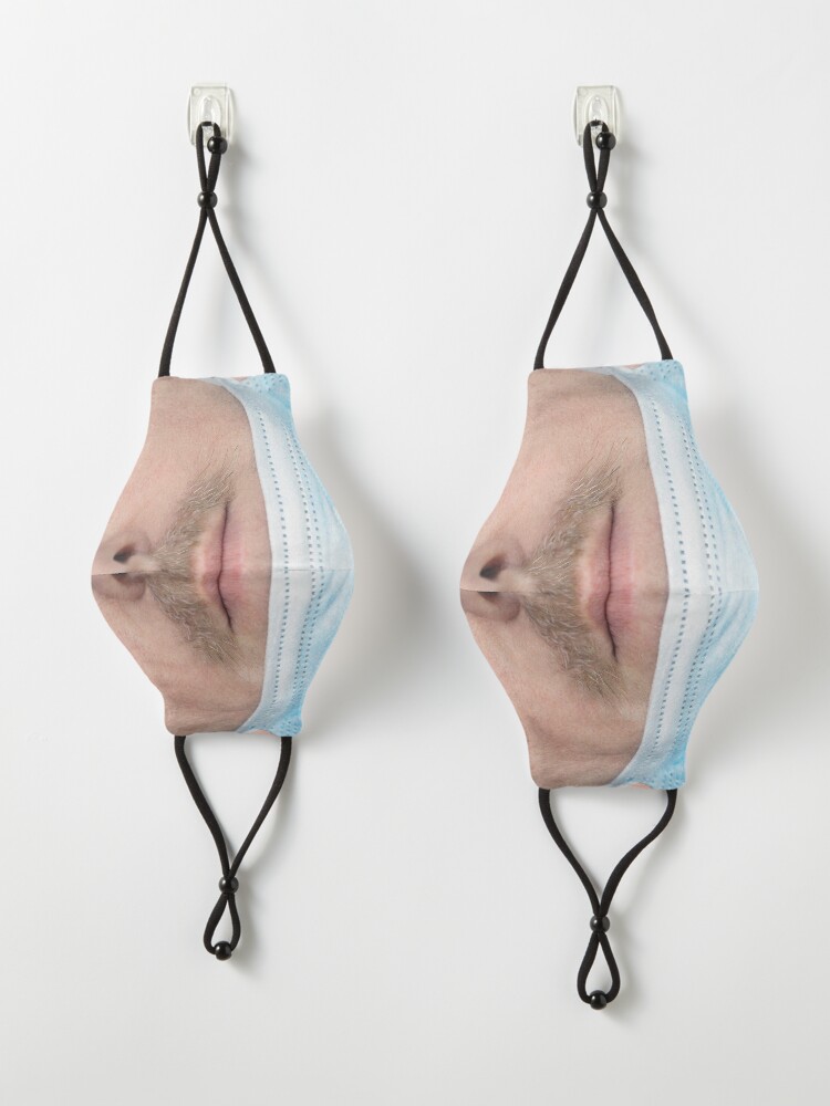Alternate view of A badly worn medical mask - Man Mask
