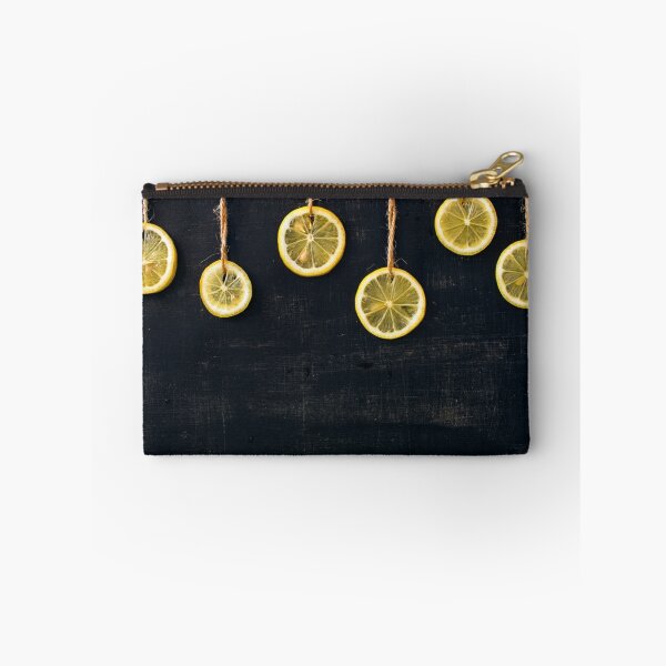 Item preview, Lemon slices on the rope on a black background designed and sold by olhakozachenko.