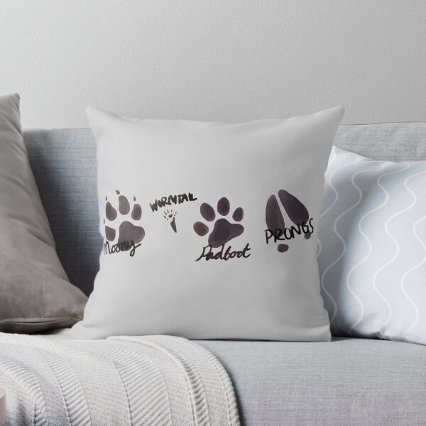 pattes magiques Coussin