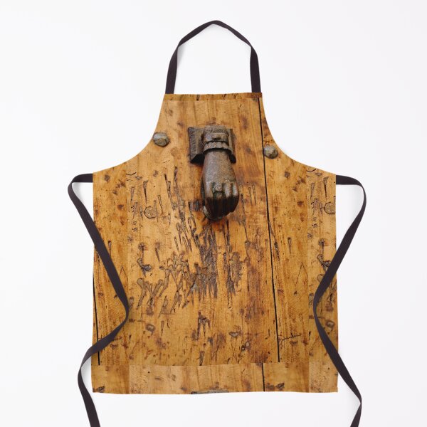 Item preview, Hand doorknocker on old wooden door designed and sold by Esther Moliné.