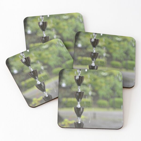 Item preview, Rain drops falling into the metal flowers of a Japanese rain chain. designed and sold by EAnneH.