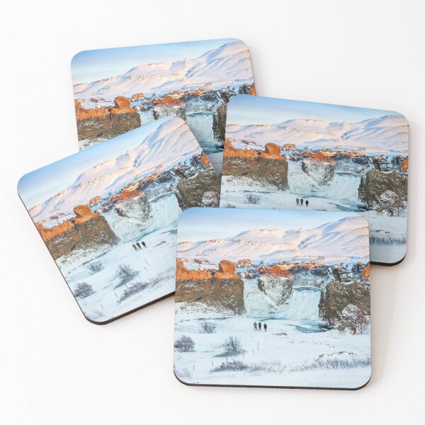 Item preview, Three people stood at the foot of an Icelandic frozen waterfall as the golden light spills over the rocks. designed and sold by Victoria Ashman.