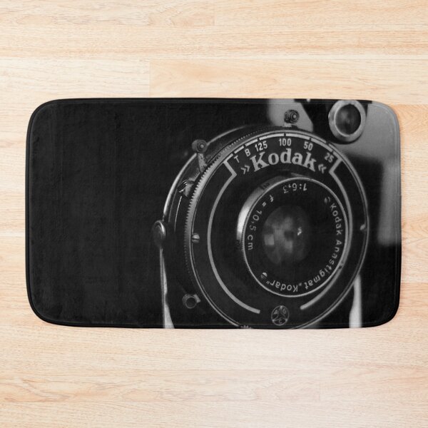 Item preview, Close-up photo of a retro analog camera in black and white designed and sold by Diana van Neck.