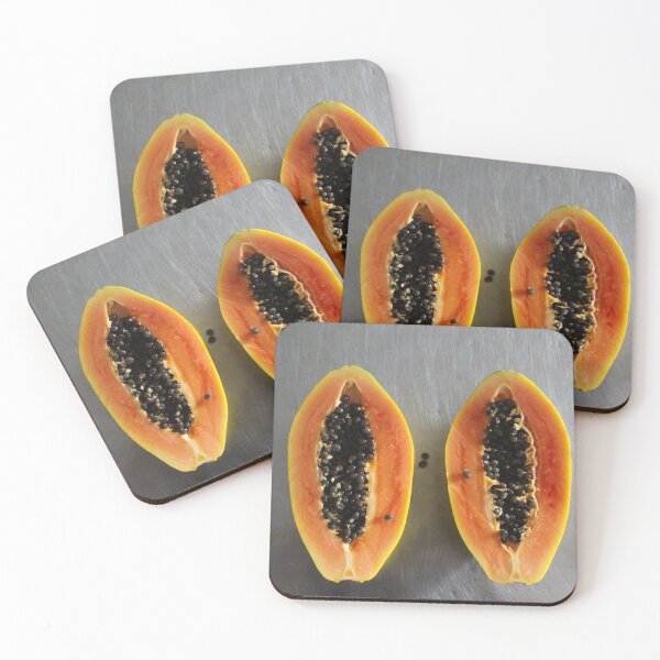 Item preview, Papaya fruit cut in half on the kitchen table designed and sold by Mahirov Shop.