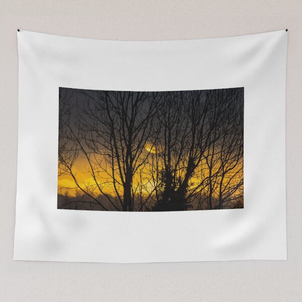 Item preview, Winter sunrise through trees in Knowbury, Shropshire designed and sold by HalcyonPrints.