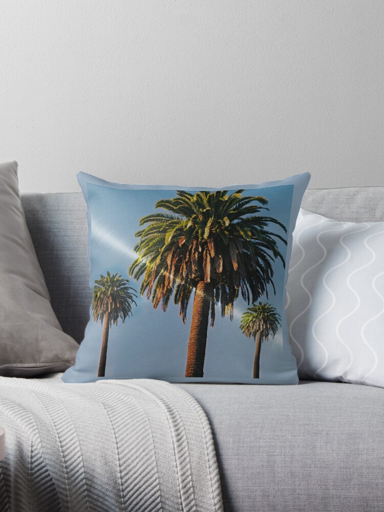 Throw Pillow, Palm Trees With A Flash Of Sunlight.  designed and sold by BDMcT