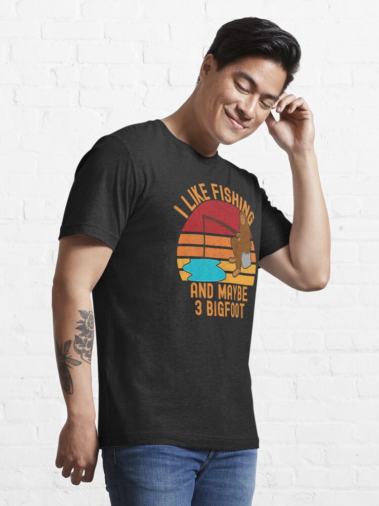 Alternate view of Bigfoot fishing, I like fishing and maybe 3 bigfoot Essential T-Shirt