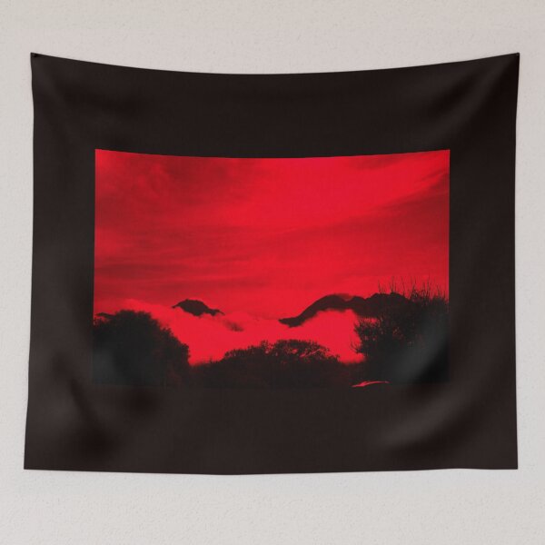 Item preview, New Zealand tiered scene of high country mountains and bush shrouded by low cloud with wind-blow cloud above in red and black effect. designed and sold by Brian Scantlebury.