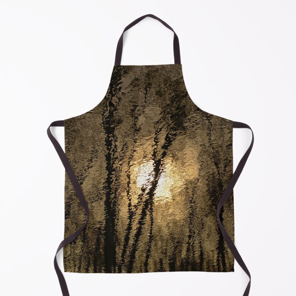 Item preview, Reflection of sun and bare trees in soft rippling water designed and sold by xophotography.