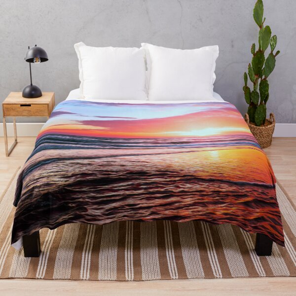Item preview, Stunning Sunset, bright colors, blues, purples, pinks and oranges over smooth calm waves. Beautiful colorful sunset at the beach with a smoothing filter effect.  designed and sold by Orianah.