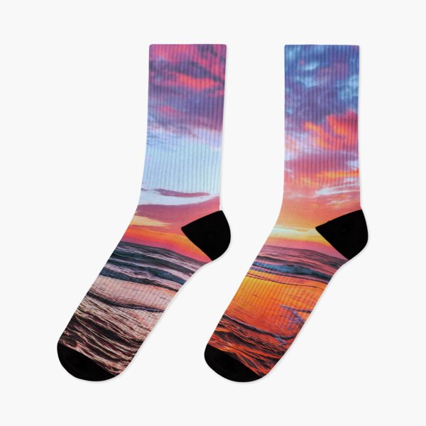 Item preview, Stunning Sunset, bright colors, blues, purples, pinks and oranges over smooth calm waves. Beautiful colorful sunset at the beach with a smoothing filter effect.  designed and sold by Orianah.