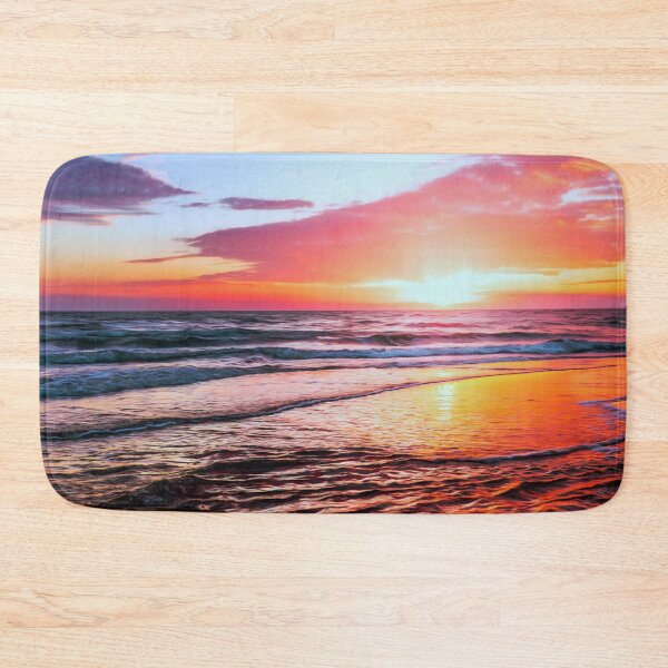 Item preview, Stunning Sunset, bright colors, blues, purples, pinks and oranges over smooth calm waves. Beautiful colorful sunset at the beach with a smoothing filter effect.  designed and sold by Orianah.