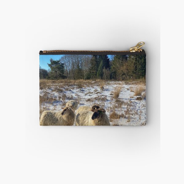 Item preview, Group of horned sheep in the snow on the heath in The Netherlands designed and sold by Photopat.