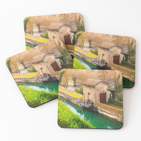 Item preview, ancient structure of the river lock along the canal surrounded by thick vegetation designed and sold by fineartitalia.