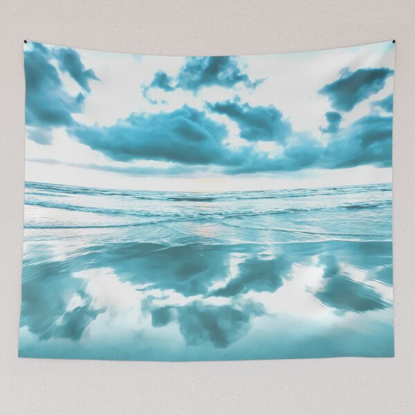 Item preview, Light blue and cloudy sky, over beach and water, blues, whites and greys. Reflection of clouds in the water. Photograph with smooth effect, soothing and calming.  designed and sold by Orianah.