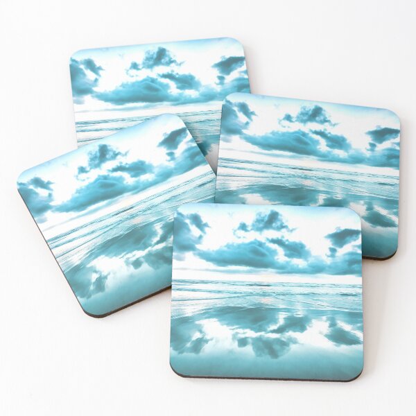 Item preview, Light blue and cloudy sky, over beach and water, blues, whites and greys. Reflection of clouds in the water. Photograph with smooth effect, soothing and calming.  designed and sold by Orianah.