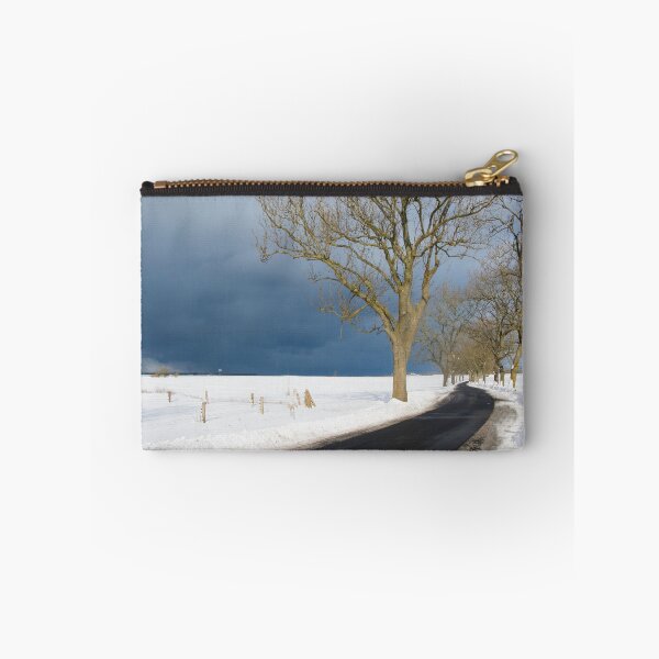Item preview, Country tree-lined road in the snow against a dark sky designed and sold by Michael Brewer.