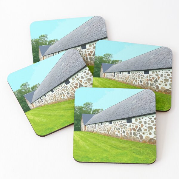 Item preview, Stone wall of a Swedish barn with green grass under a blue sky designed and sold by Michael Brewer.