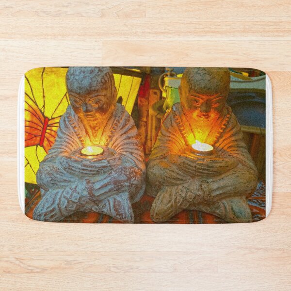 Item preview, Pair of candlelit terra cotta Buddhas in a shop window designed and sold by Michael Brewer.