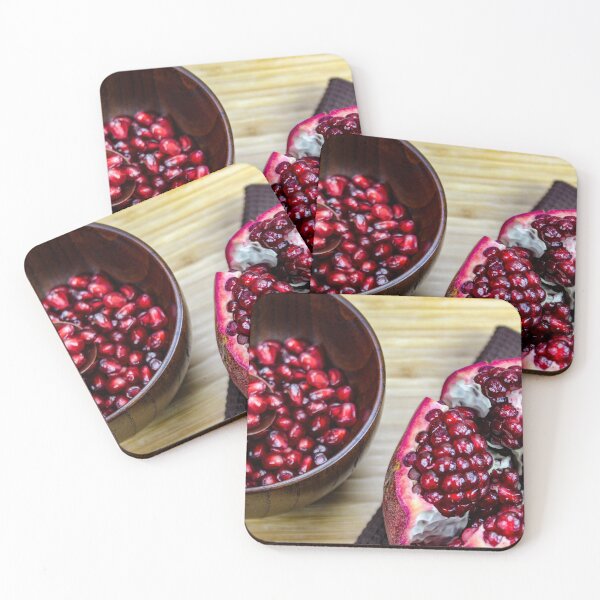 Item preview, Red pomegranate fruit seeds in a wooden bowl designed and sold by Mahirov Shop.