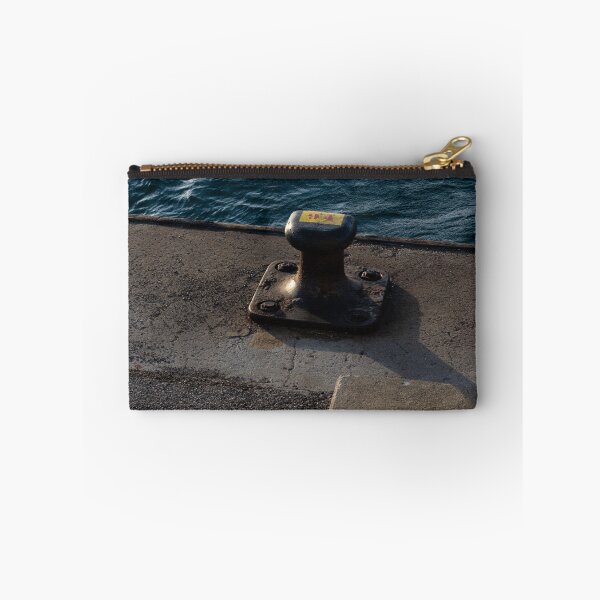 Item preview, sea bollard in a harbor with a sea in the background designed and sold by Alberto Morales Romero.
