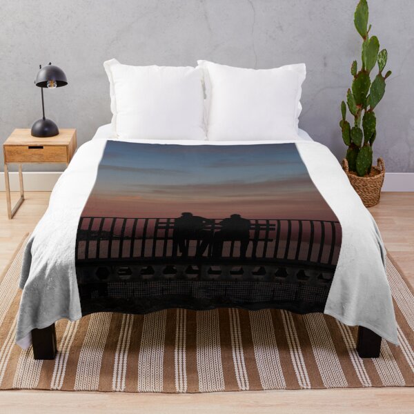 Item preview, two silhouettes of men sitting on a bench watching the sunset on the beach designed and sold by Alberto Morales Romero.