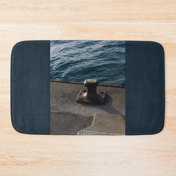 Item preview, sea bollard in a harbor with a sea in the background designed and sold by Alberto Morales Romero.