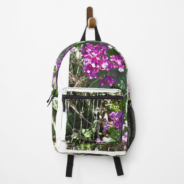 Item preview, Flower on wire fence. Flowers in the garden, spring, April, designed and sold by UnsereWelt.