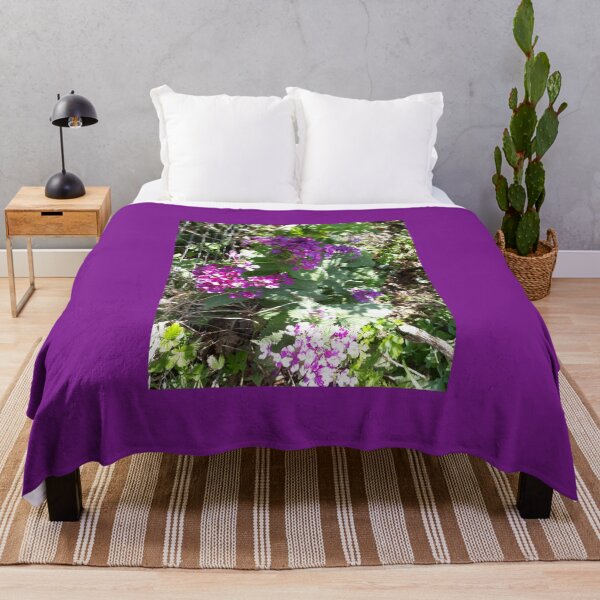 Item preview, Flower on wire fence. Flowers in the garden, spring, April, designed and sold by UnsereWelt.