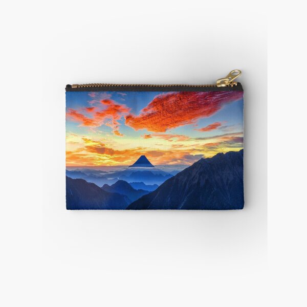 Item preview, Calm sky, Rocky mountains, dark blue, orange, yellow sky, orange clouds, hills silhouette designed and sold by August-E.