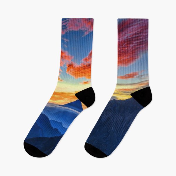 Item preview, Calm sky, Rocky mountains, dark blue, orange, yellow sky, orange clouds, hills silhouette designed and sold by August-E.