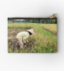 Hard at work in the rice feilds Studio Pouch