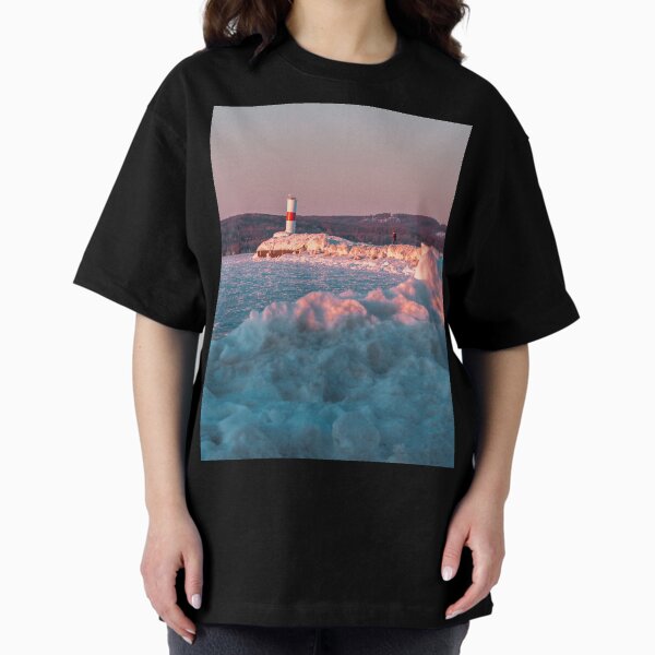 Lighthouse in Petoskey Michigan during the winter Oversized T-Shirt
