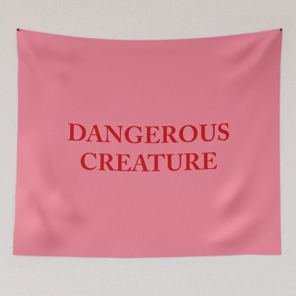 Item preview, Dangerous Creature - Wears Pink sweater to preside over senate - Well Read woman is a Dangerous Creature designed and sold by TekknoOutfits.