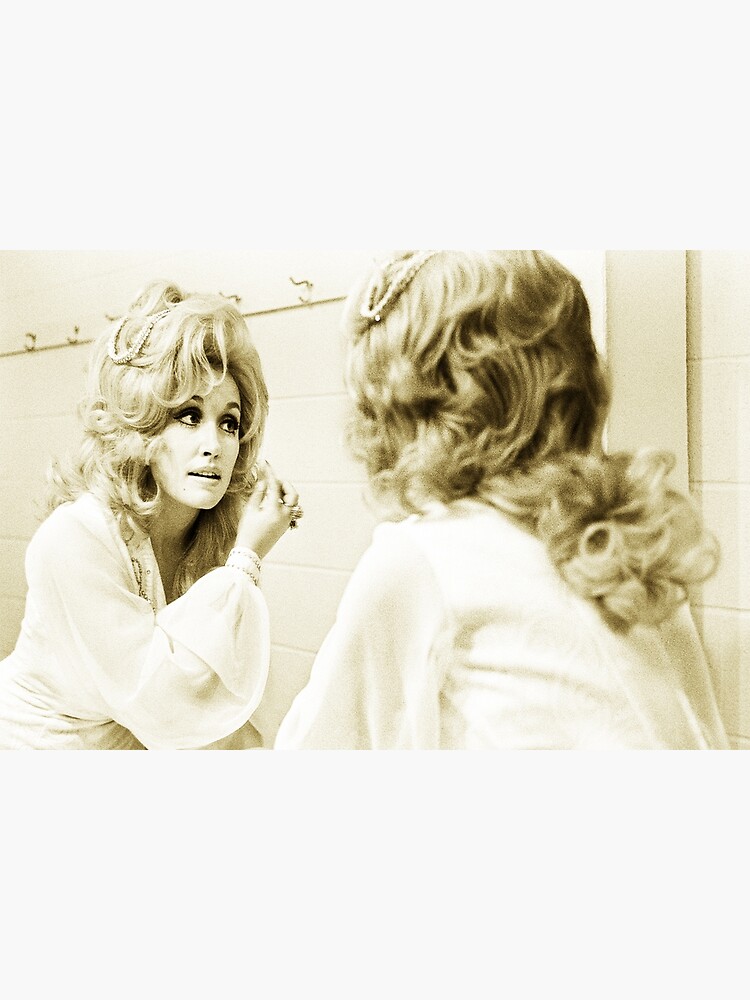 Discover Dolly parton – applying facial make-up ready for a concert as shown in the adjacent picture Premium Matte Vertical Poster
