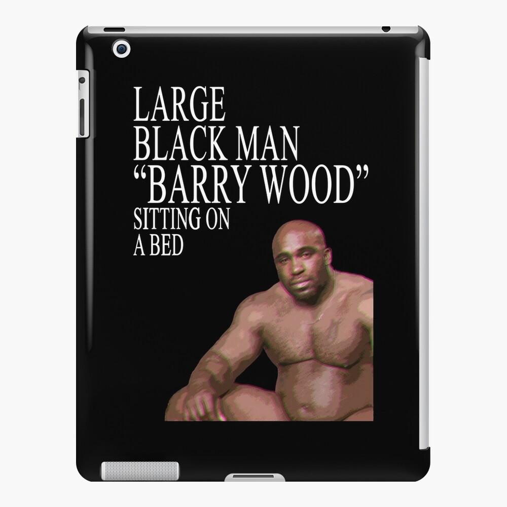 Large Black Man Barry Wood Sitting On a Bed | Pillow