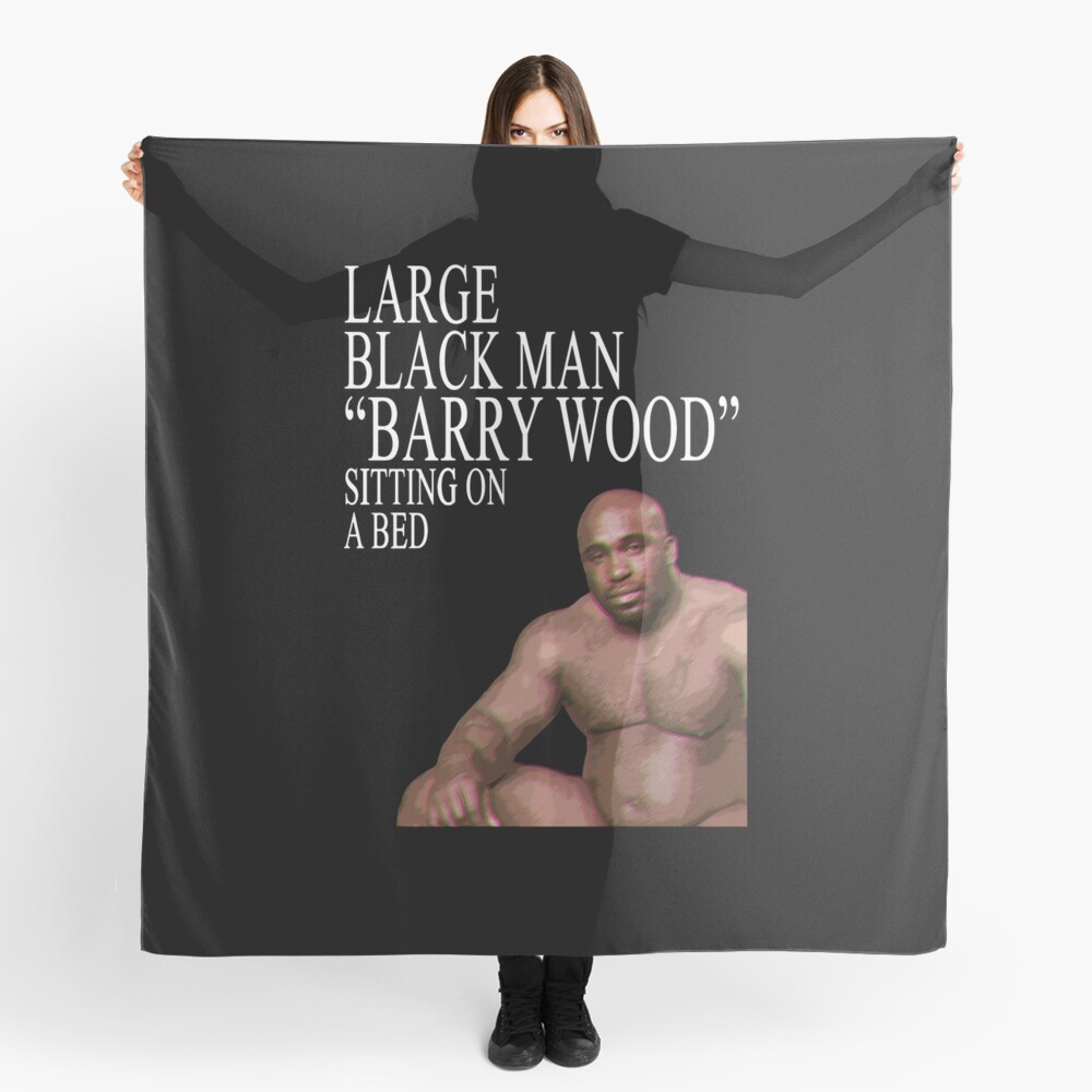 Large Black Man Barry Wood Sitting On a Bed | Scarf