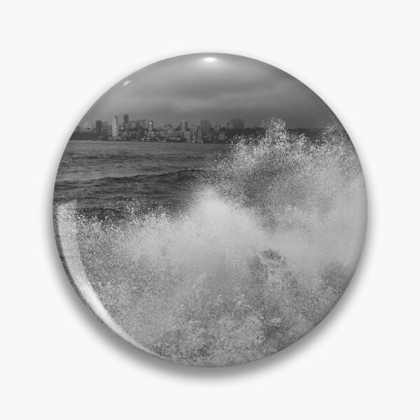 Item preview, Mumbai skyline in rainy season with huge waves hitting shore in black and white designed and sold by CameraDesign.