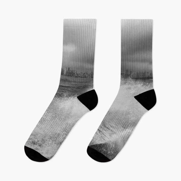 Item preview, Mumbai skyline in rainy season with huge waves hitting shore in black and white designed and sold by CameraDesign.