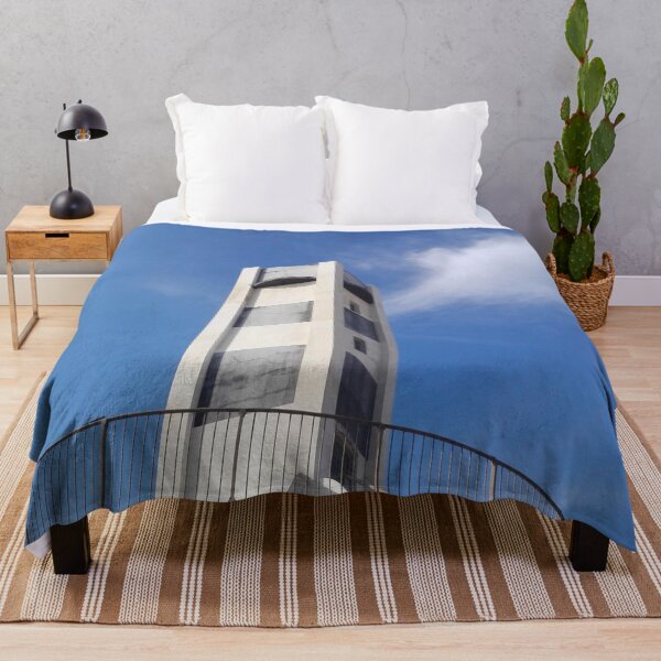 Item preview, Gray and white tower and blue sky with clouds in Tel Aviv designed and sold by elenah0707.