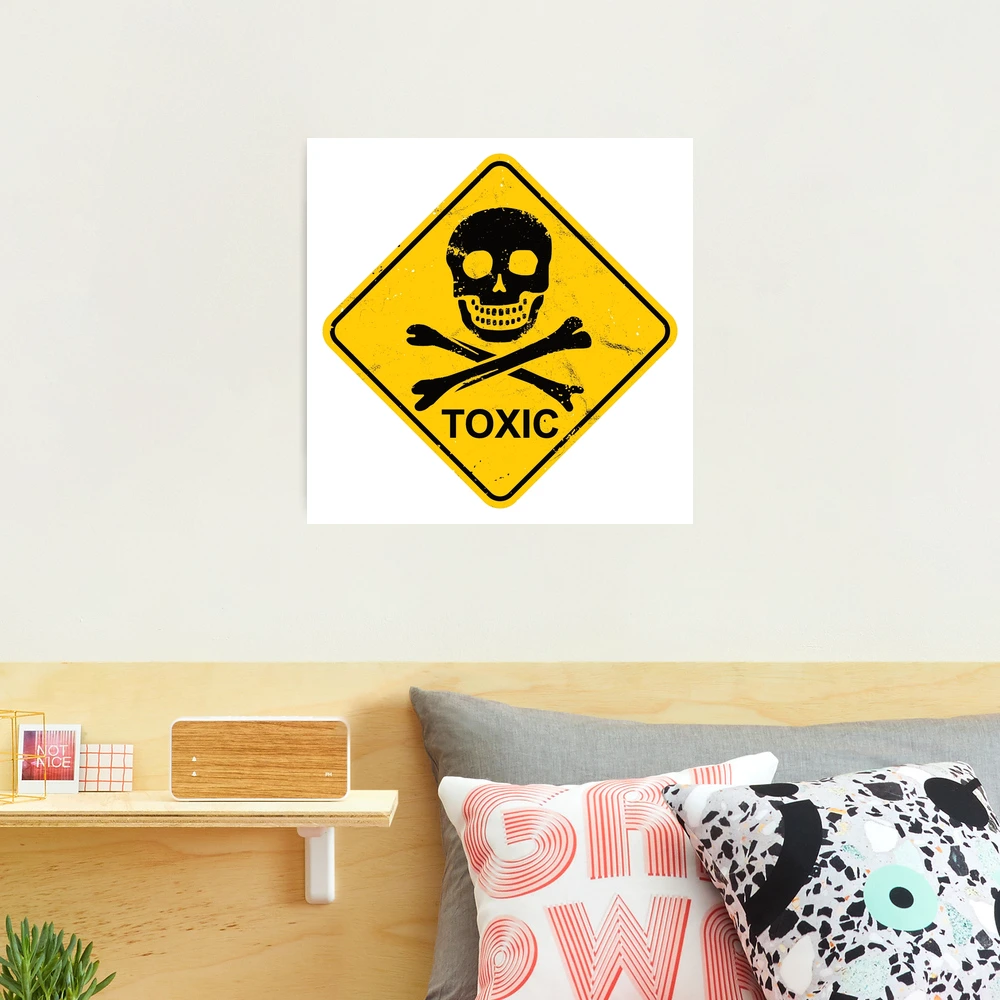 Toxic symbol with skull and crossbones on a yellow square