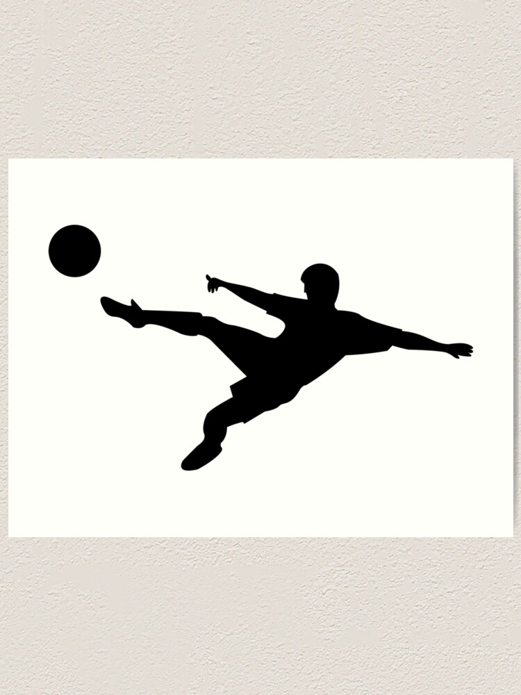 Horizontal image of soccer ball being kicked by footballer against