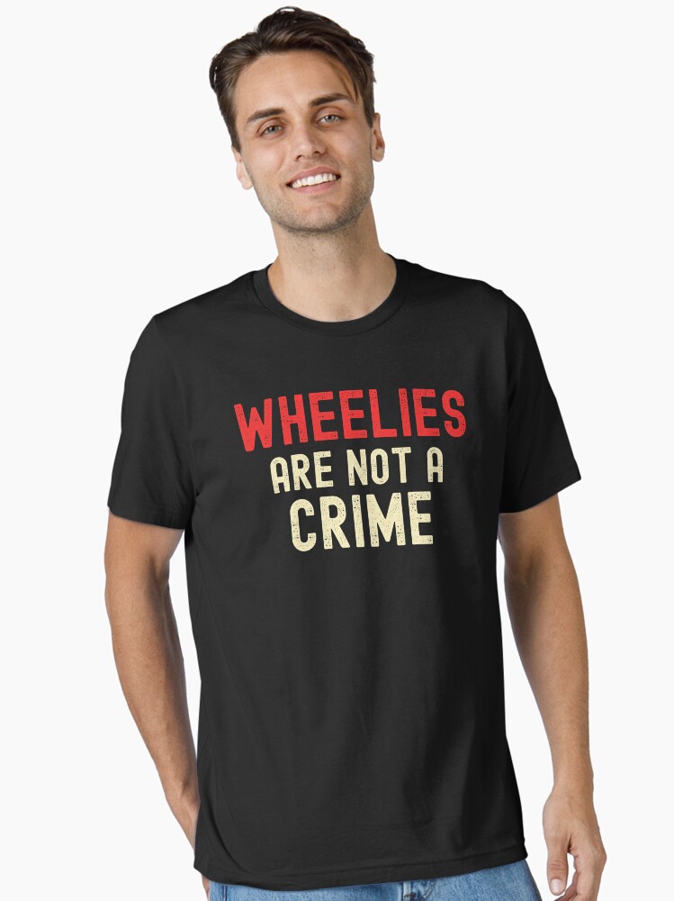 Thumbnail 1 of 7, Essential T-Shirt, Wheelies Are Not A Crime  designed and sold by ds-4.