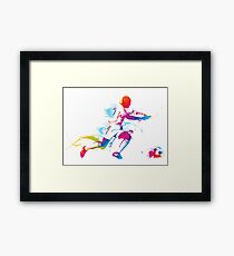 Colorful footballer chasing the ball graphics Framed Print