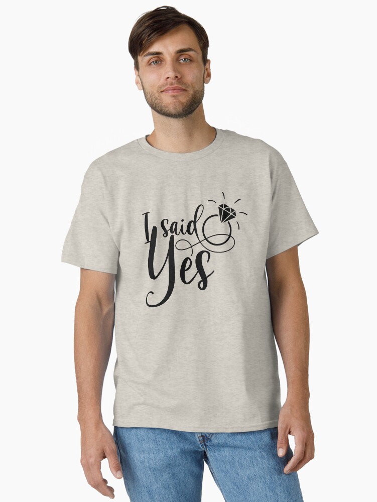 Thumbnail 1 of 7, Classic T-Shirt, Copy of I said yes, engaged bride to be designed and sold by Dollfacedesign.