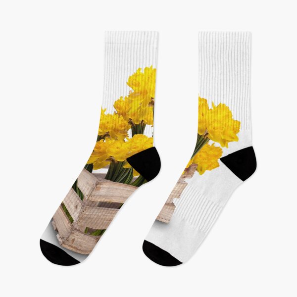 Item preview, Daffodils in a wooden crate isolated designed and sold by simonbratt.