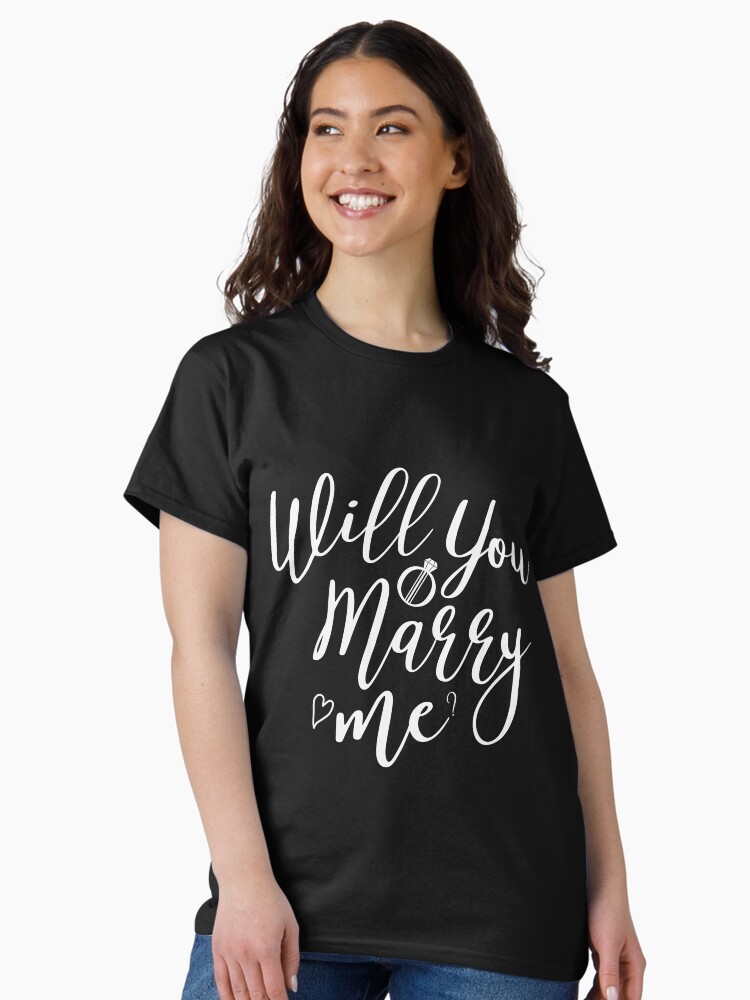 Thumbnail 1 of 7, Classic T-Shirt, Will You Marry Me? engagement Wedding designed and sold by Dollfacedesign.