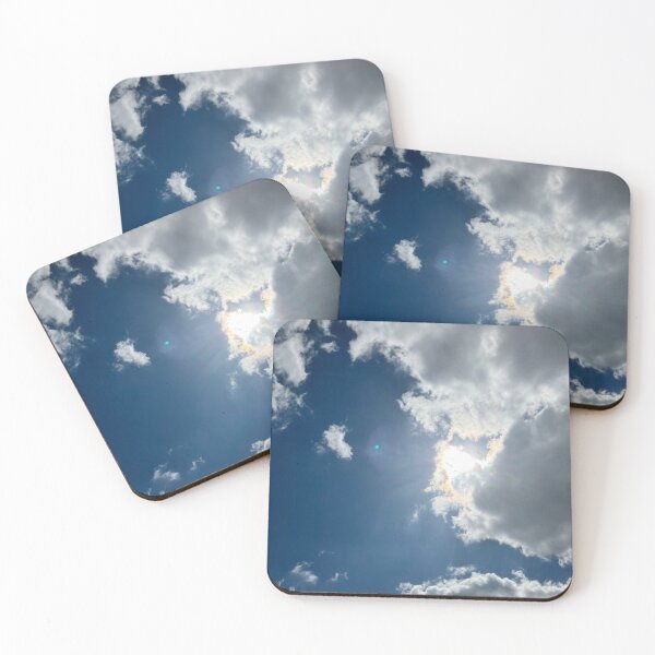 Item preview, Sunshine peeking through the clouds in a deep blue sky designed and sold by Christine Clayton.